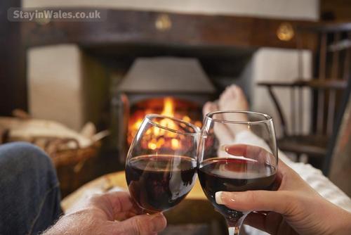 the perfect place to relax in front of a roaring log fire with a glass of wine