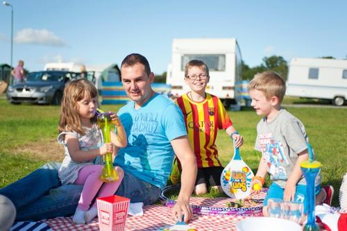 Family picnic at Woodland Park - Vale Holiday Parks