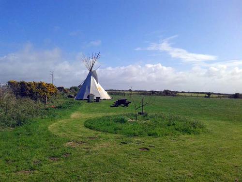 One of our three tipis, each of which sleeps 6 so book them all together to sleep up to 18.