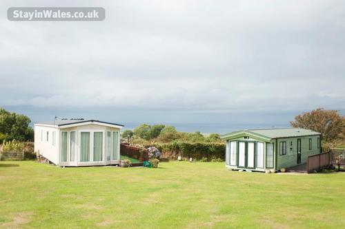 Two caravans on the green at Ocean Heights, Vale Holiday Parks