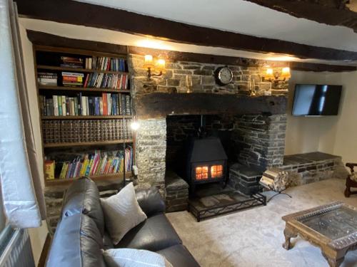 Lounge with wood burner and Inglenook Fireplace