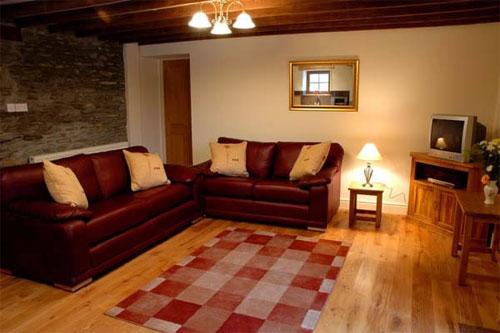 beautiful oak floors and stone walls